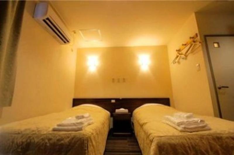 Comfesta Inn Kabe Ome Bagian luar foto