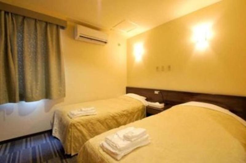 Comfesta Inn Kabe Ome Bagian luar foto