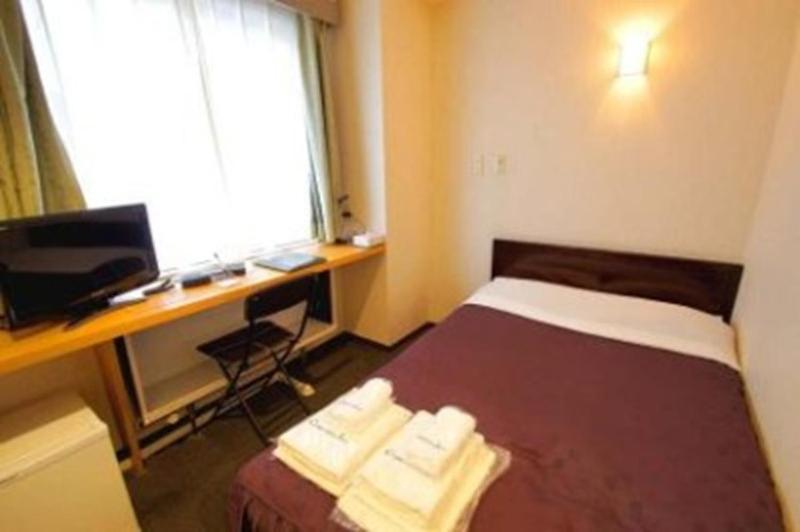 Comfesta Inn Kabe Ome Bagian luar foto